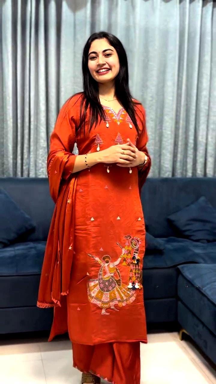 Cotton suit in different figure embroidery touch available in orange and mustard color