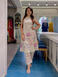 Cotton flex haulter neck kurti pant set with one side pocket in kurti and embroidery details on kurti