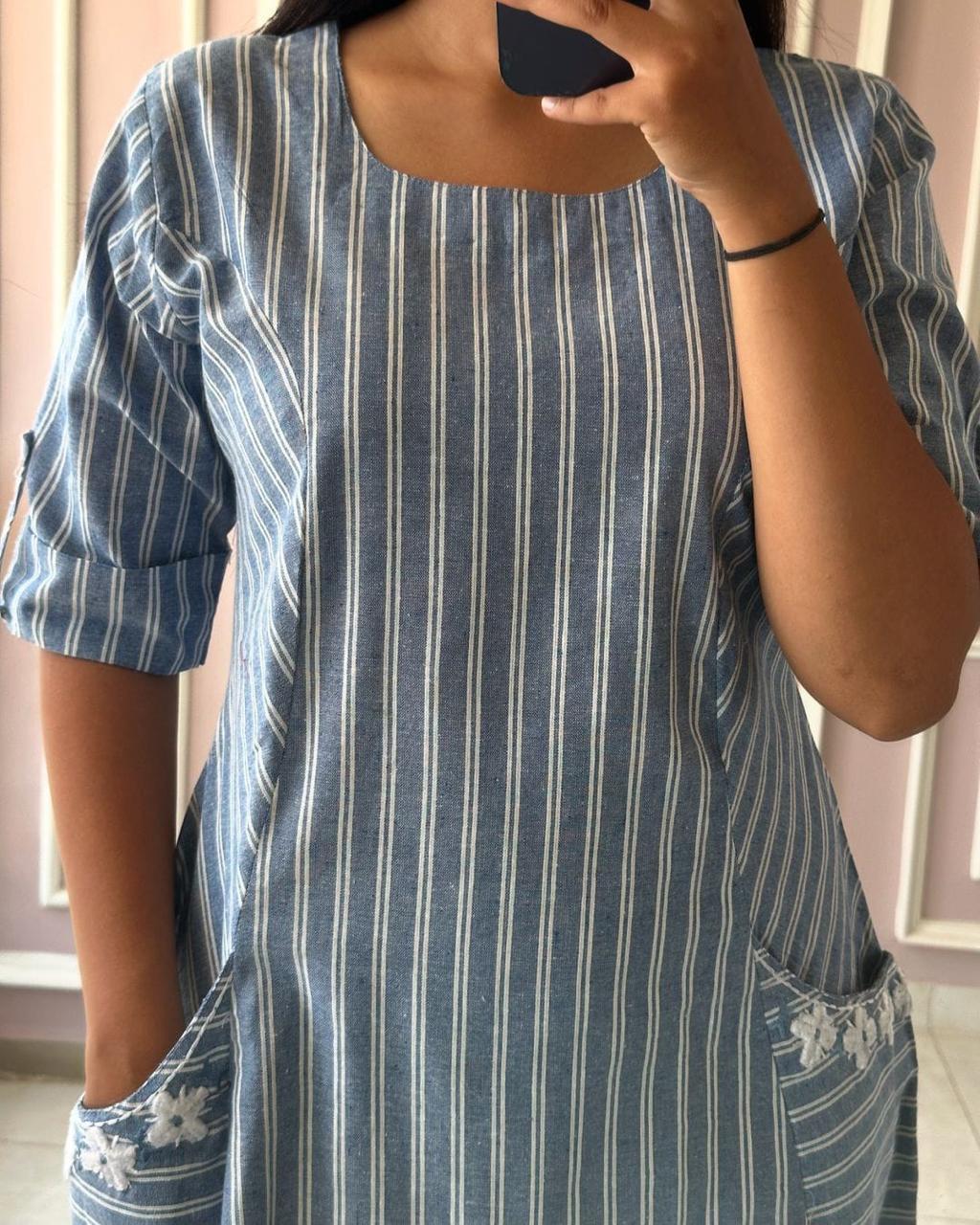 One piece dress in south cotton with pocket details on both side