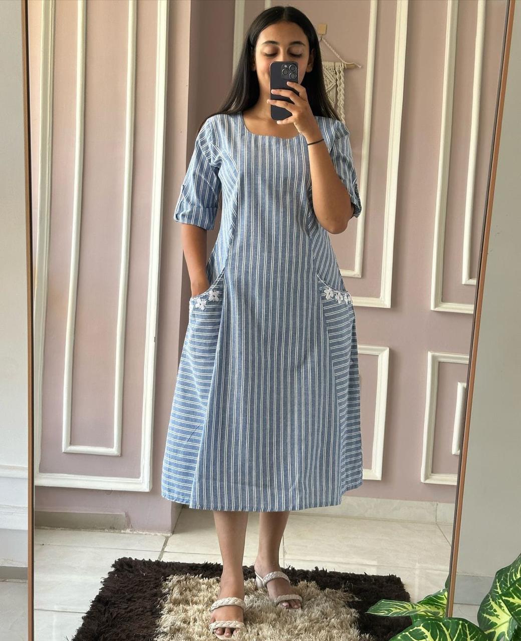 One piece dress in south cotton with pocket details on both side