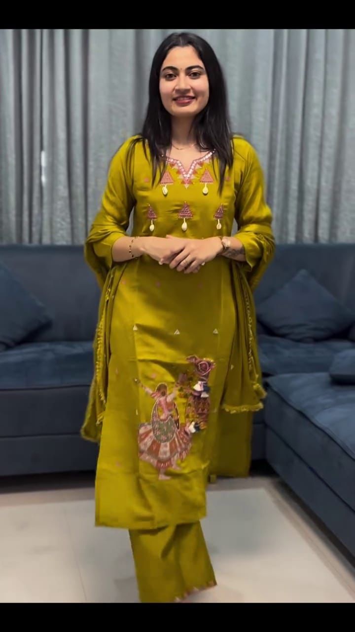 Cotton suit in different figure embroidery touch available in orange and mustard color
