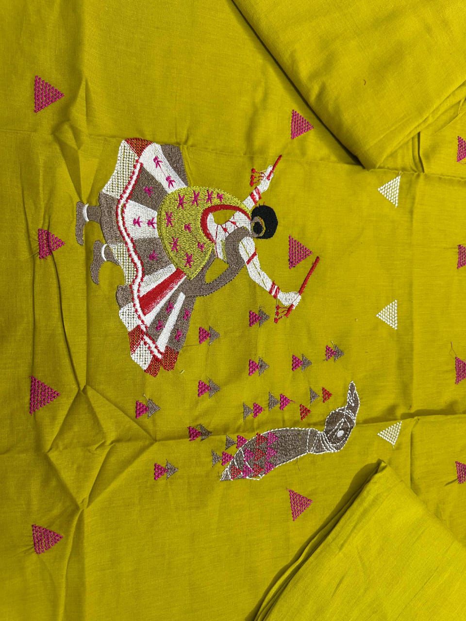Cotton suit in different figure embroidery touch available in orange and mustard color